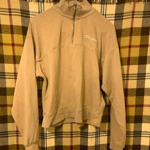 ** One xs tan Champion cropped sweatshirt **